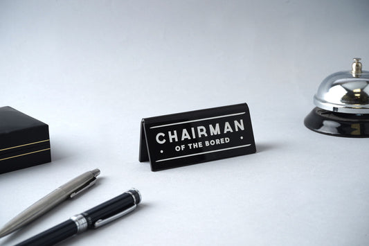 'Chairman Of The Bored' Black Desk Sign