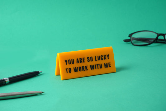 Yellow Acrylic Desk Sign 'You Are So Lucky To Work With Me'
