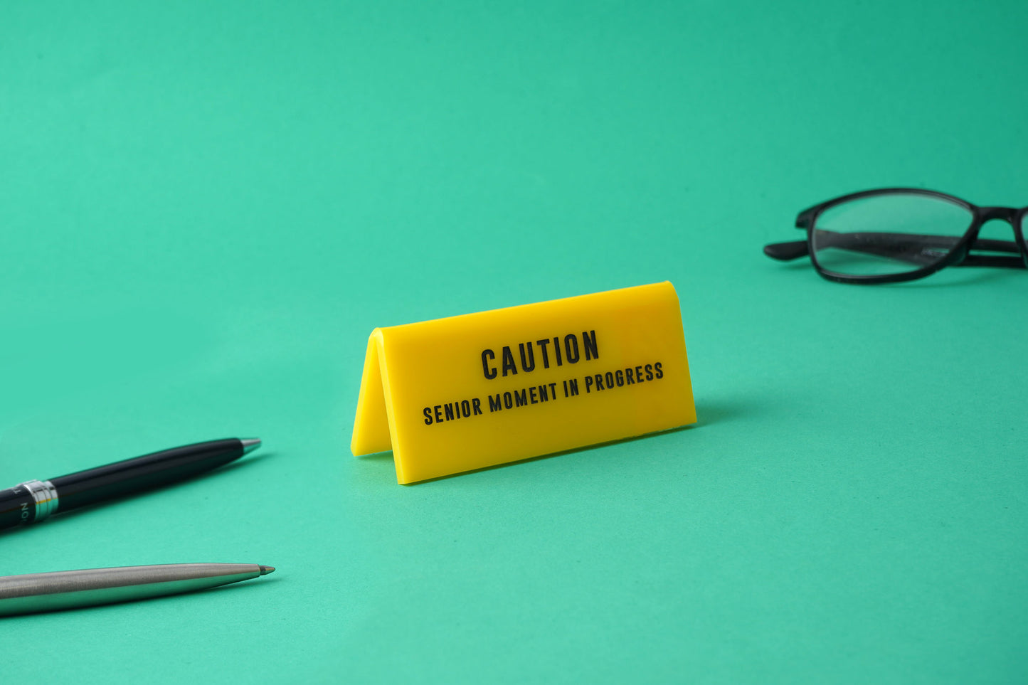 'Senior Moment In Progress' Yellow Desk Sign