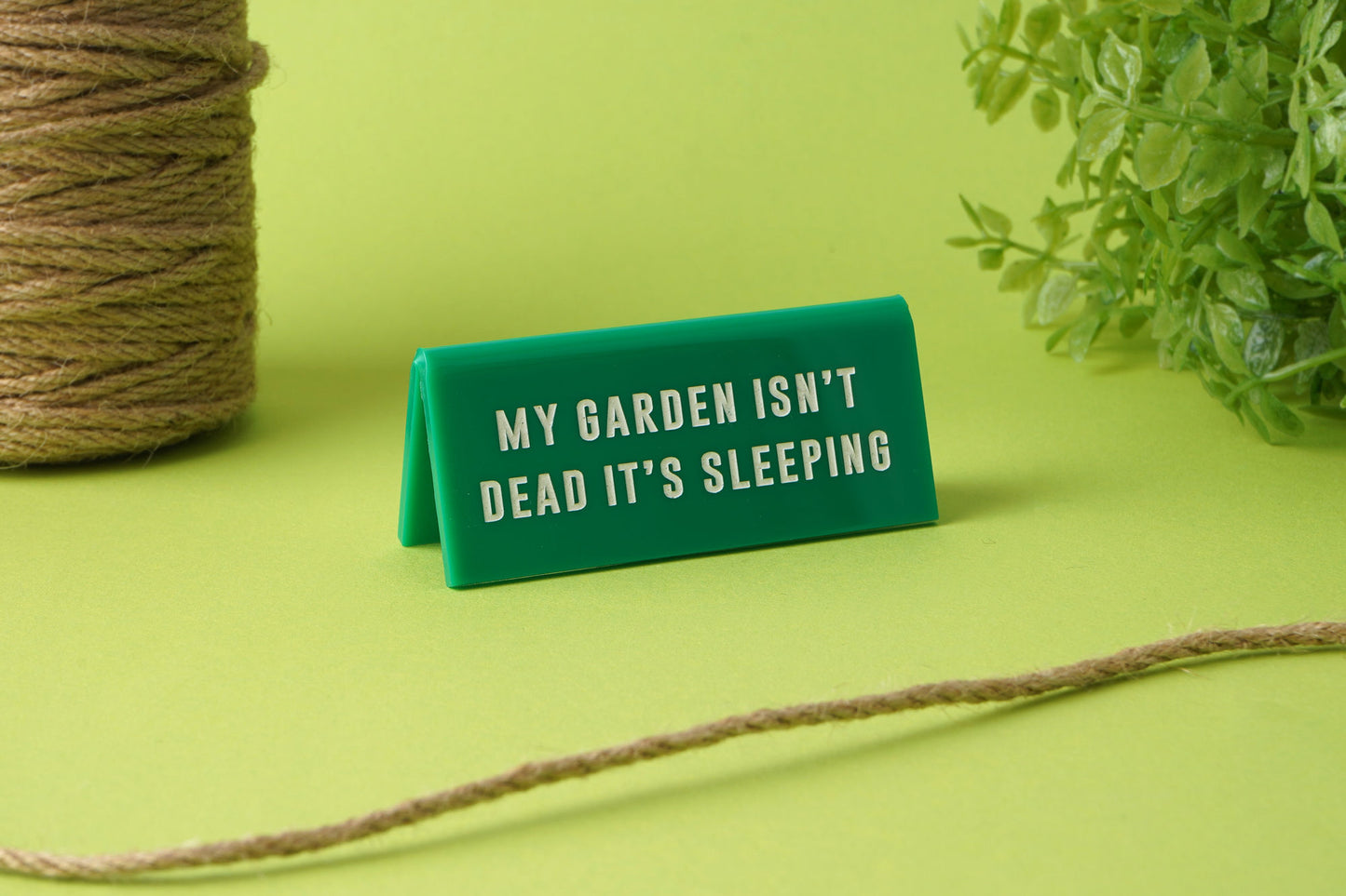 'Garden Isn't Dead It's Sleeping' Green Desk Sign